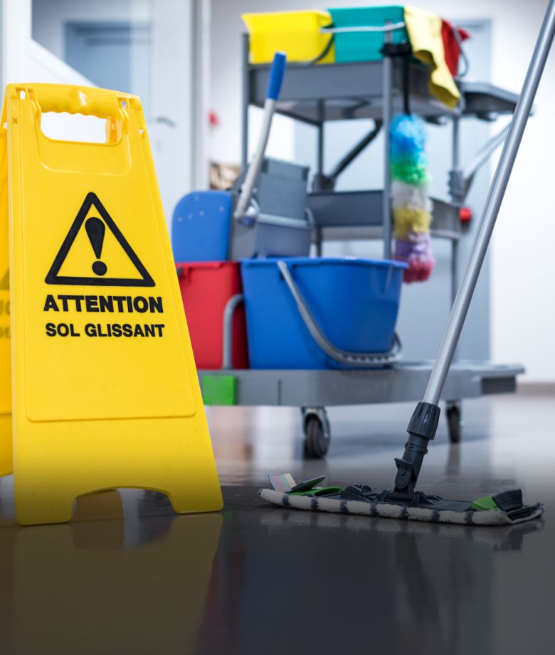 Worker janitor Mopping Floor In Office with trolley